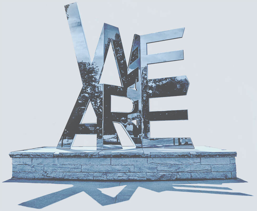 Stylized light blue duotone image of the We Are sculpture
